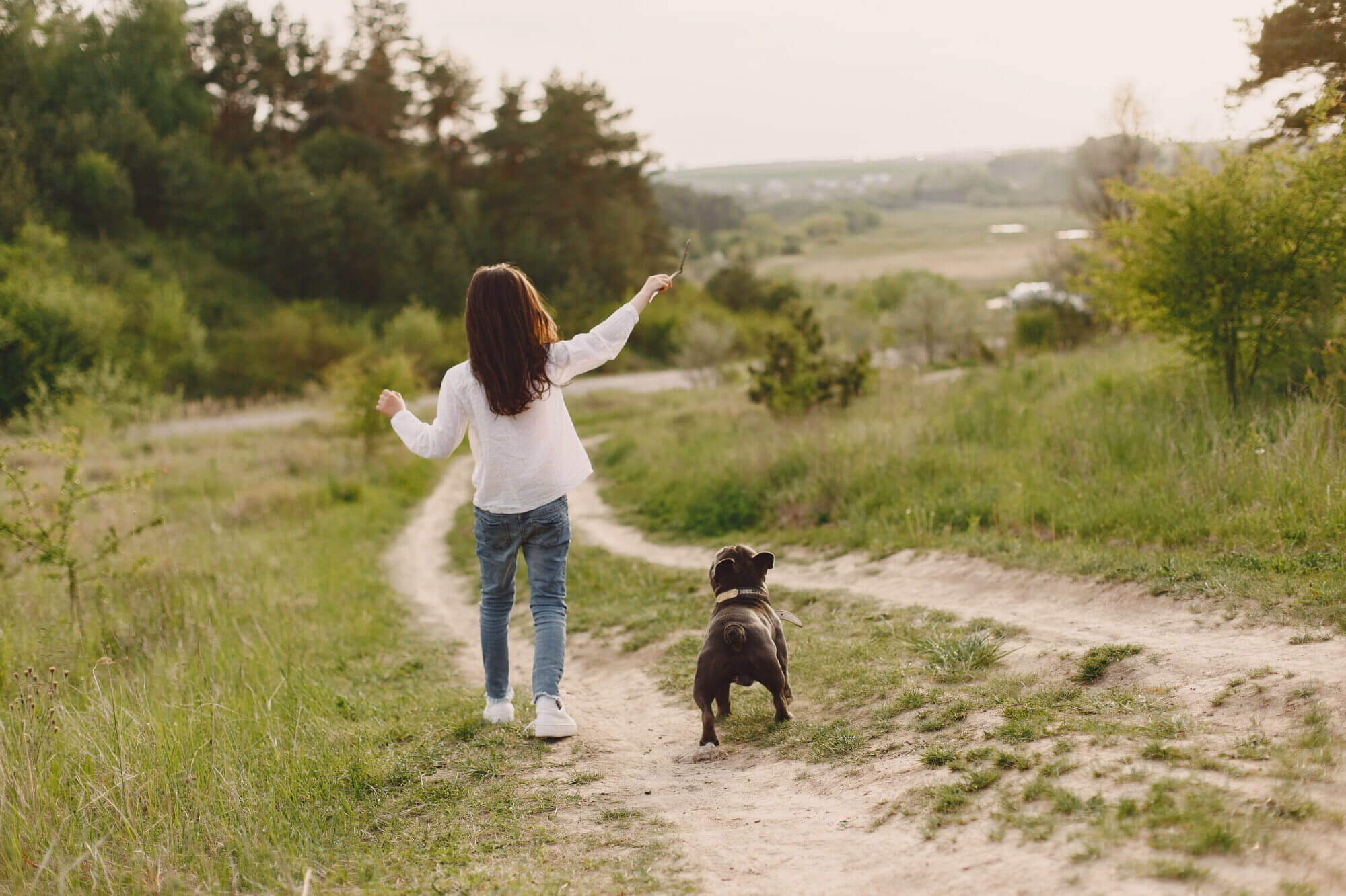 Portrait of a little girl with her beautiful dog